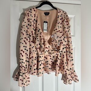 bebe Pink Ruffle V-neck wrap around blouse with sunnies print. NWT. Medium
